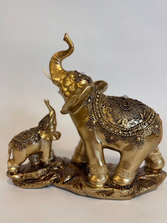 ✨ Dúo de Elefantes Dorados Figuras elegantes que simbolizan abundancia, protección y buena fortuna. Ideales para decorar y atraer energía positiva al hogar o negocio