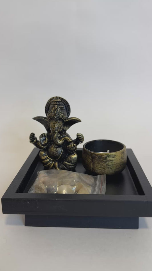Porta Vela Ganesha Figura sagrada del dios hindú Ganesha, removedor de obstáculos y dador de abundancia. Acompaña la luz de la vela atrayendo prosperidad, protección y sabiduría al hogar